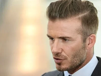 David Beckham ikut menolong wanita tua