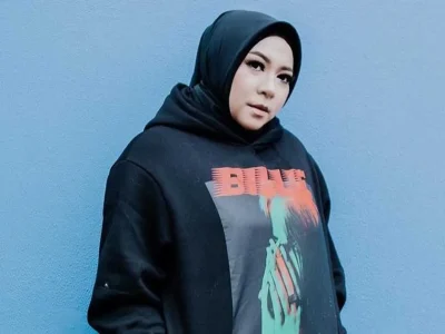 Ibu Melly Goeslaw