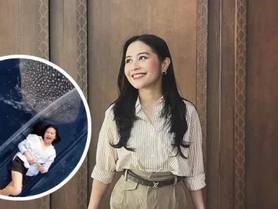 BERANI: Prilly Latuconsina bernyanyi sambil ditemani Hiu Paus. Foto : Instagram/prillylatuconsina96