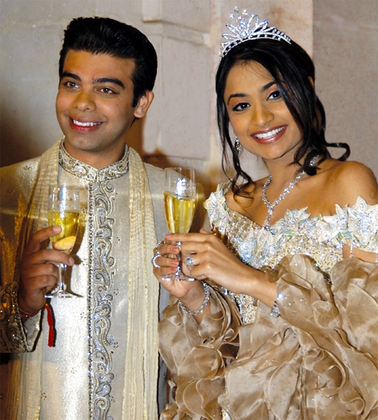 Vanisha Mittal dan Amit Bhatia. Foto: Dok. Reuters