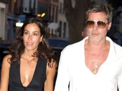 Potret Ines de Ramon bersama Brad Pitt, sambil mengenakan liontin berbentuk “I” yang bertabur berlian. Foto : GC