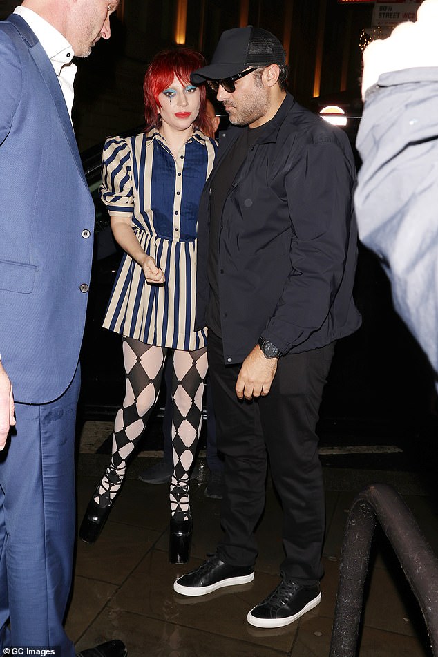 Lady Gaga dan tunangannya, Michael Polansky saat menghadiri acara fans (Foto: GC Images)