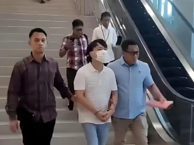 Ivan ditetapkan sebagai tersangka atas kasus paksa siswa minta maaf sambil menggonggong. (Foto: Istimewa)