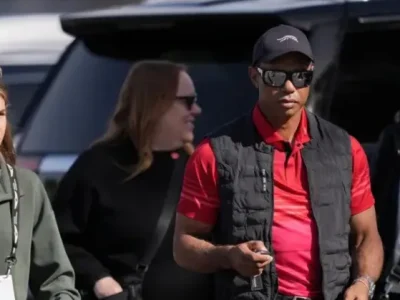 Kai Trump, Tiger Woods, dan Vanessa Trump tampak terlihat bersama. (FOTO: GETTY IMAGE)