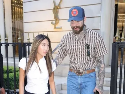 Post Malone tertangkap kamera dengan pacar barunya, Christy Lee. (Foto: Aissaoui Nacer/SplashNews.com)