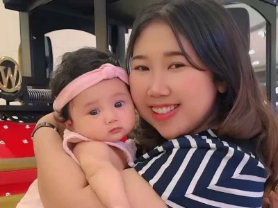 Kiky Saputri menggendong anak. Foto : Instagram/kikysaputrii
