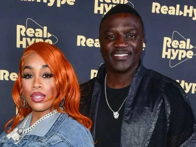 CERAI: Tomeka Thiam dan pelantun 'Smack That' Akon. Foto : Vivien Killilea/Getty