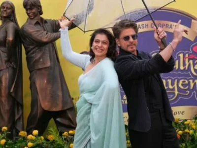 Kajol dan Shah Rukh Khan saat peresmian patung film Dilwale Dulhania Le Jayenge di London. Foto : AP